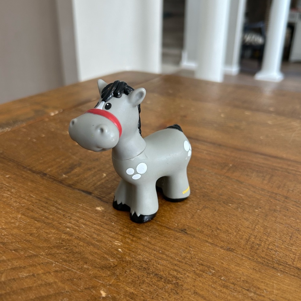 Fisher Price Little People grey horse as is. Has damage to mouth